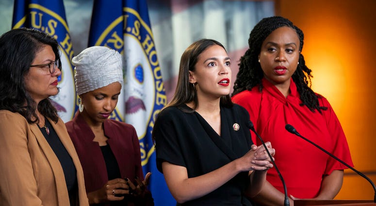 FILE - In this July 15, 2019, file photo, from left, Rep. Rashida Tlaib, D-Mich., Rep. Ilhan Omar, D-Minn., Rep. Alexandria Ocasio-Cortez, D-N.Y., and Rep. Ayanna Pressley, D-Mass., speak at the Capitol in Washington.