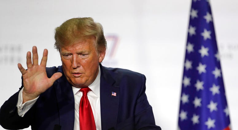 President Donald Trump gestures as he speaks during a press conference on the third and final day of the G-7 summit in Biarritz, France Monday, Aug. 26, 2019.