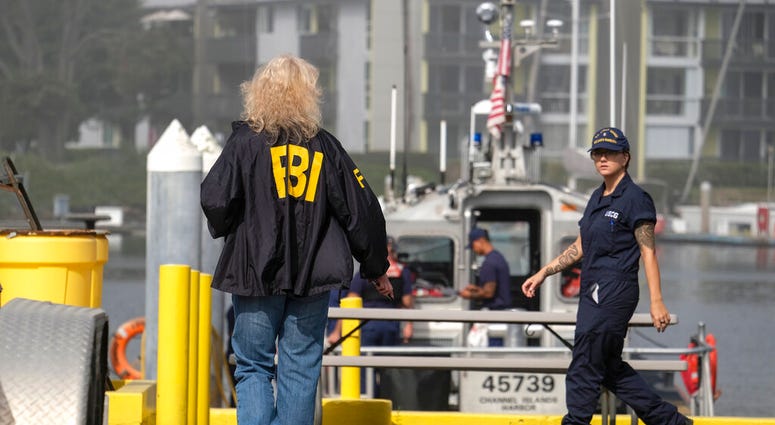 FBI and Coast Guard personnel work together at U.S. Coast Guard Station Channel Islands in Oxnard, Calif., Monday, Sept. 2, 2019, as multiple people are feared dead after a dive boat caught fire before dawn Monday off the Southern California coast.