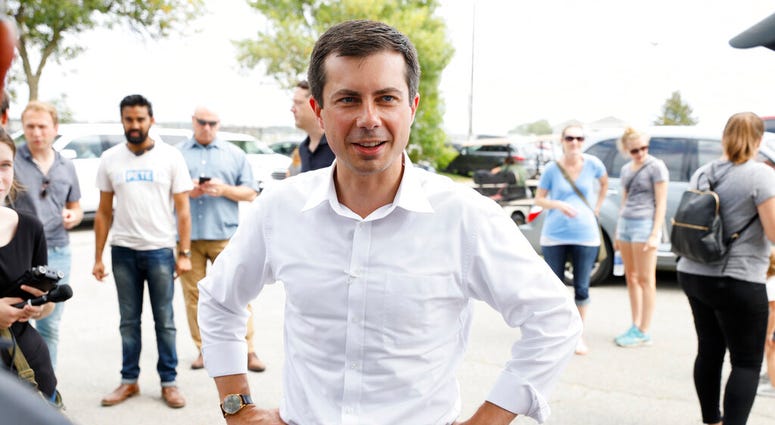 Democratic presidential candidate Pete Buttigieg talks with attendees at the Hawkeye Area Labor Council Labor Day Picnic, Monday, Sept. 2, 2019, in Cedar Rapids, Iowa. (AP Photo/Charlie Neibergall)