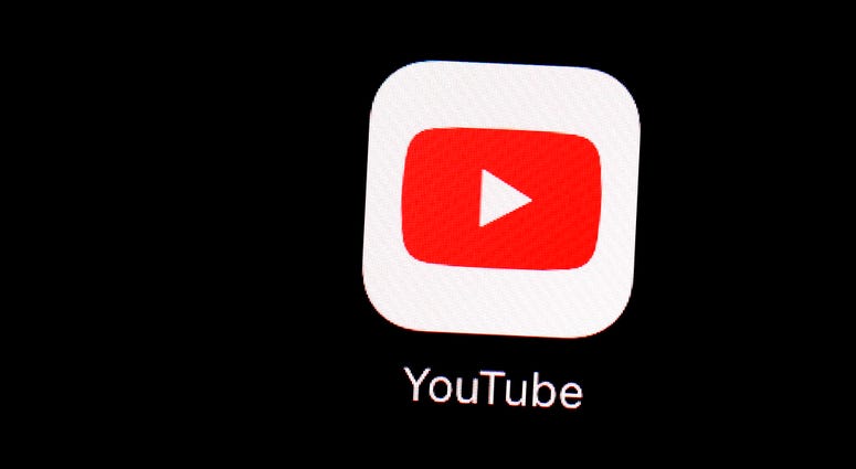 FILE - This March 20, 2018, file photo shows the YouTube app on an iPad in Baltimore. Google's video site YouTube has been fined $170 million to settle allegations it collected children's personal data without their parents' consent.
