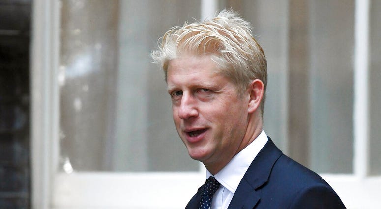 FILE - In this Wednesday, Sept. 4, 2019 file photo, Britain's Conservative Party lawmaker Jo Johnson arrives at Downing Street in London. J