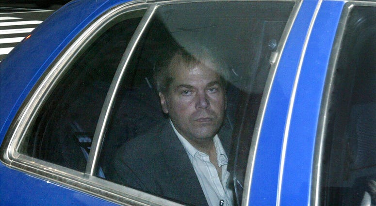 FILE - In this Nov. 18, 2003 file photo, John Hinckley Jr. arrives at U.S. District Court in Washington. The man who tried to assassinate President Ronald Reagan is interested in getting a job in the music industry, possibly in California.