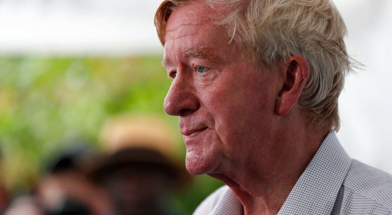 FILE - In this Aug. 11, 2019, file photo, Republican presidential candidate and former Massachusetts Gov. Bill Weld speaks to reporters during a visit to the Iowa State Fair in Des Moines, Iowa. Republican leaders in Iowa and New Hampshire are vowing to h