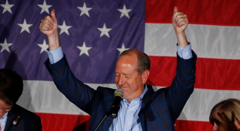North Carolina 9th district Republican congressional candidate Dan Bishop celebrates his victory in Monroe, N.C., Tuesday, Sept. 10, 2019. (AP Photo/Nell Redmond)