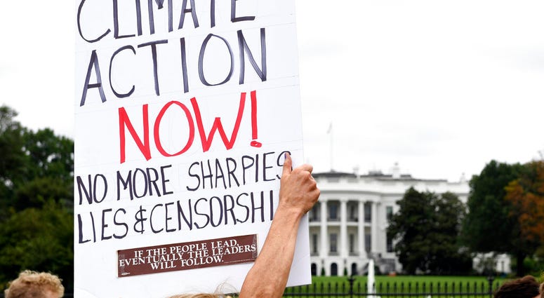 Activists protest during a rally outside the White House in Washington, Friday, Sept. 13, 2019. (AP Photo/Susan Walsh) Activists protest during a rally outside the White House in Washington, Friday, Sept. 13, 2019. (AP Photo/Susan Walsh)