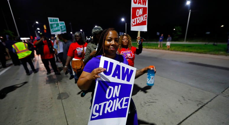 United Auto Workers members picket outside the General Motors Detroit-Hamtramck assembly plant in Hamtramck, Mich., early Monday, Sept. 16, 2019. (AP Photo/Paul Sancya) United Auto Workers members picket outside the General Motors Detroit-Hamtramck assembly plant in Hamtramck, Mich., early Monday, Sept. 16, 2019. (AP Photo/Paul Sancya)