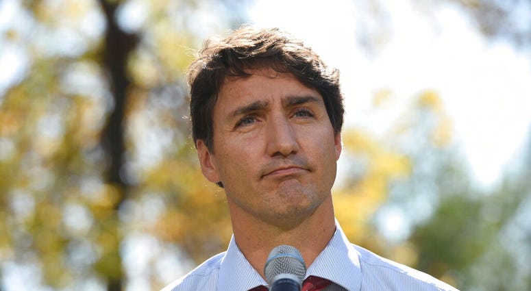 Canada's Prime Minister Justin Trudeau addresses the media in Winnipeg, Manitoba, Thursday, Sept. 19, 2019. Trudeau's campaign was hit Wednesday by the publication of a yearbook photo showing him in brownface makeup at a 2001 costume party.