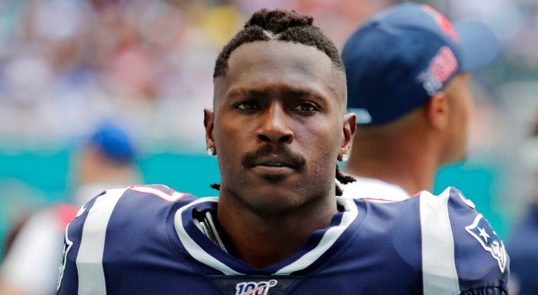 ILE - In this Sunday, Sept. 15, 2019, file photo, New England Patriots wide receiver Antonio Brown (17) on the sidelines,during the first half at an NFL football game against the Miami Dolphins in Miami Gardens, Fla.