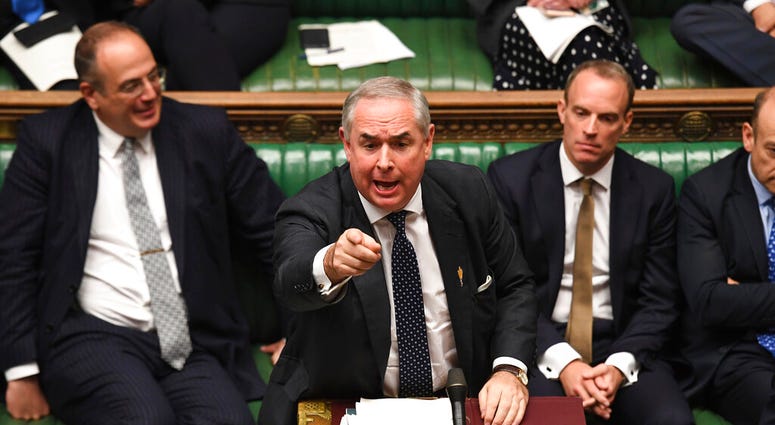 In this handout photo provided by the House of Commons, Britain's General Attorney Geoffrey Cox speaks in Parliament in London, Wednesday, Sept. 25, 2019.