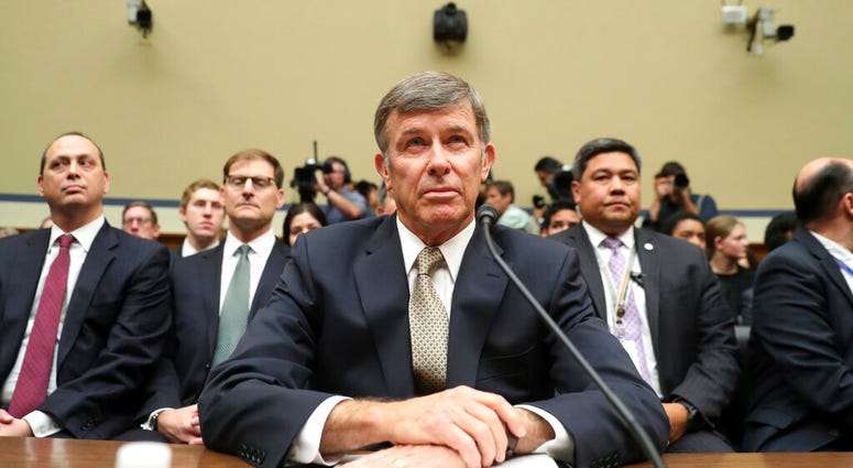 Acting Director of National Intelligence Joseph Maguire takes his seat before testifying before the House Intelligence Committee on Capitol Hill in Washington, Thursday, Sept. 26, 2019. (AP Photo/Andrew Harnik)