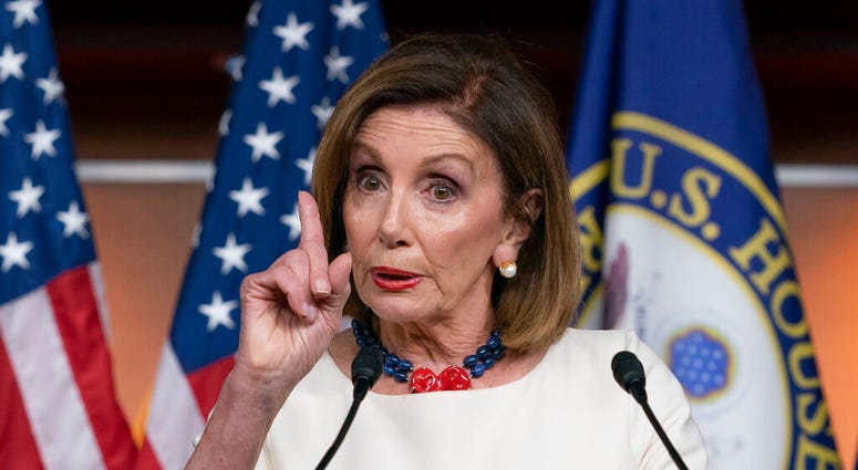 Speaker of the House Nancy Pelosi, D-Calif., addresses reporters at the Capitol in Washington, Thursday, Sept. 26, 2019. (AP Photo/J. Scott Applewhite)