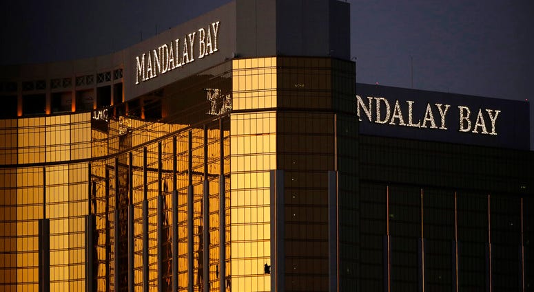 In this Oct. 3, 2017, file photo, windows are broken at the Mandalay Bay resort and casino in Las Vegas, the room from where Stephen Craig Paddock fired on a nearby music festival, killing 58 and injuring hundreds on Oct. 1. (AP Photo/John Locher, File)