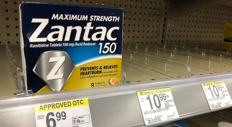 A box of Maximum Strength Zantac tablets is shown at a pharmacy, Monday, Sept. 30, 2019, in Miami Beach, Fla. CVS has halted sales of the popular heartburn treatment and the store generic version after warnings by U.S. health regulators.