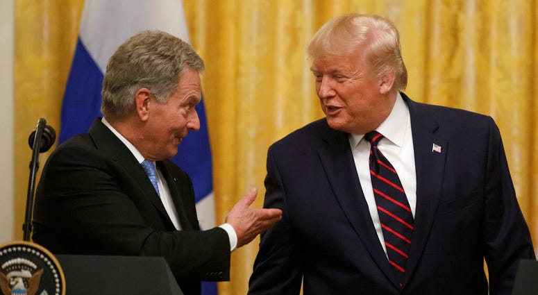 President Donald Trump and Finnish President Sauli Niinisto participate in a news conference at the White House in Washington, Wednesday, Oct. 2, 2019. (AP Photo/Carolyn Kaster)