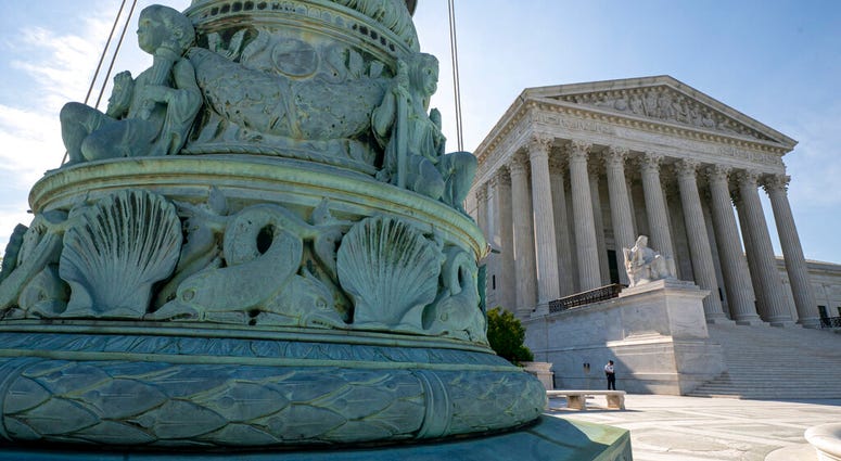 ILE - In this June 17, 2019 file photo, The Supreme Court is seen in Washington. Abortion rights, and protections for young immigrants and LGBT people top an election-year agenda for the Supreme Court.
