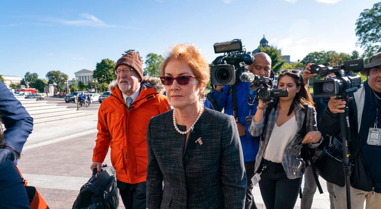 Former U.S. ambassador to Ukraine Marie Yovanovitch, arrives on Capitol Hill, Friday, Oct. 11, 2019, in Washington, as she is scheduled to testify before congressional lawmakers on Friday as part of the House impeachment inquiry into President Donald Trum