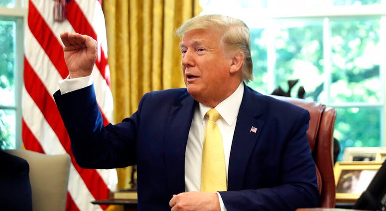 President Donald Trump speaks as he meets with Chinese Vice Premier Liu He in the Oval Office of the White House in Washington, Friday, Oct. 11, 2019. (AP Photo/Andrew Harnik)
