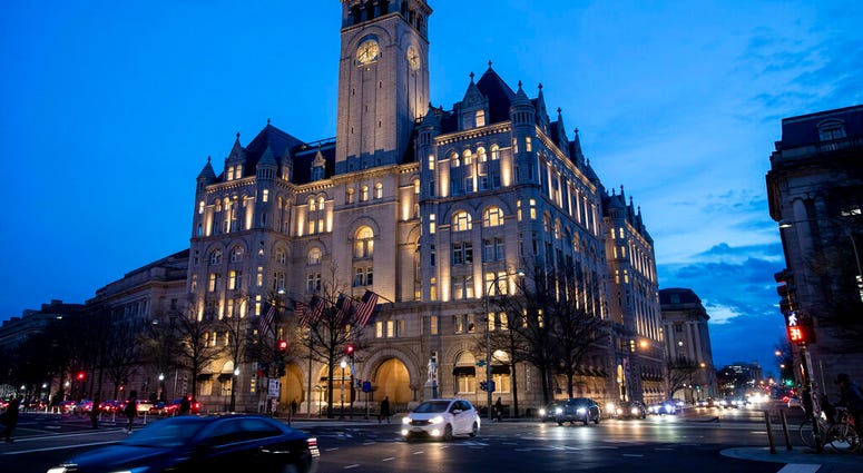FILE - In this Jan. 23, 2019, file photo, the Trump International Hotel near sunset in Washington. (AP Photo/Alex Brandon, File) FILE - In this Jan. 23, 2019, file photo, the Trump International Hotel near sunset in Washington. (AP Photo/Alex Brandon, File)