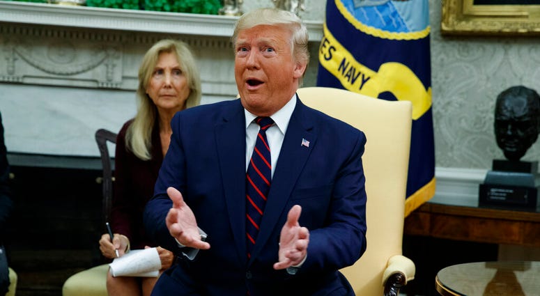President Donald Trump speaks during a meeting with Italian President Sergio Mattarella in the Oval Office of the White House, Wednesday, Oct. 16, 2019, in Washington. (AP Photo/Evan Vucci)