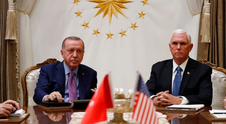 Vice President Mike Pence meets with Turkish President Recep Tayyip Erdogan at the Presidential Palace for talks on the Kurds and Syria, Thursday, Oct. 17, 2019, in Ankara, Turkey. (AP Photo/Jacquelyn Martin)