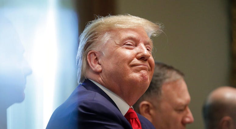 President Donald Trump listens during a Cabinet meeting in the Cabinet Room of the White House, Monday, Oct. 21, 2019, in Washington. (AP Photo/Pablo Martinez Monsivais) President Donald Trump listens during a Cabinet meeting in the Cabinet Room of the White House, Monday, Oct. 21, 2019, in Washington. (AP Photo/Pablo Martinez Monsivais)