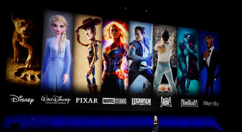 FILE - In this April 3, 2019, file photo characters from Disney and Fox movies are displayed. (Photo by Chris Pizzello/Invision/AP, File) FILE - In this April 3, 2019, file photo characters from Disney and Fox movies are displayed. (Photo by Chris Pizzello/Invision/AP, File)