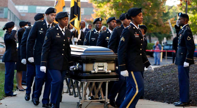 Pallbearers walk with a casket carrying the body of U.S. Rep. Elijah Cummings as it arrives at Morgan State University ahead of a public viewing, Wednesday, Oct. 23, 2019, in Baltimore. (AP Photo/Julio Cortez) Pallbearers walk with a casket carrying the body of U.S. Rep. Elijah Cummings as it arrives at Morgan State University ahead of a public viewing, Wednesday, Oct. 23, 2019, in Baltimore. (AP Photo/Julio Cortez)