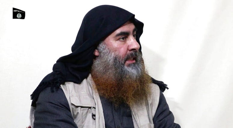 This file image made from video posted on a militant website April 29, 2019, purports to show the leader of the Islamic State group, Abu Bakr al-Baghdadi, being interviewed by his group's Al-Furqan media outlet. (Al-Furqan media via AP, File)