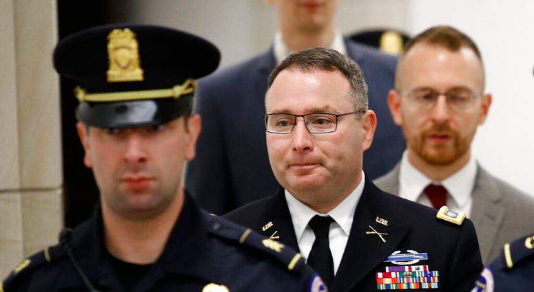 Army Lt. Col. Alexander Vindman, a military officer at the National Security Council, departs a closed door meeting after testifying. (AP Photo/Patrick Semansky)