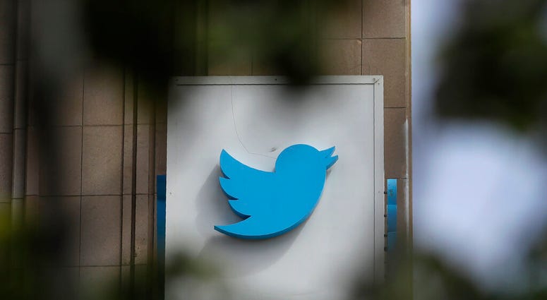 This July 9, 2019, file photo shows a sign outside of the Twitter office building in San Francisco. (AP Photo/Jeff Chiu, File)