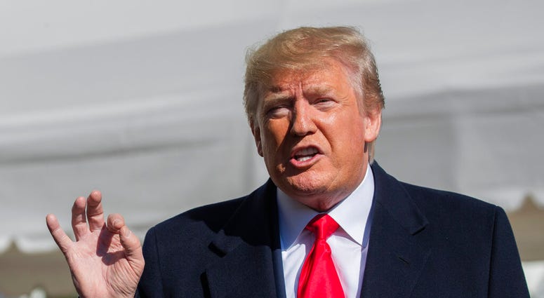 President Donald Trump speaks to reporters upon arrival at the White House in Washington, Sunday, Nov. 3, 2019. (AP Photo/Manuel Balce Ceneta)