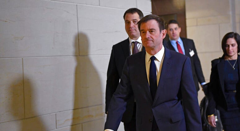 David Hale, Under Secretary of State for Political Affairs, arrives on Capitol Hill in Washington, Wednesday, Nov. 6, 2019, to be interview for the impeachment inquiry. (AP Photo/Susan Walsh)