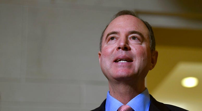 House Intelligence Committee Chairman Adam Schiff, D-Calif., talks with reporters on Capitol Hill in Washington, Wednesday, Nov. 6, 2019, about the House impeachment inquiry. (AP Photo/Susan Walsh)
