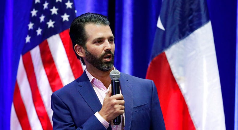 In this Oct. 15, 2019, photo, Donald Trump Jr. speaks to supporters of his father, President Donald Trump, during a panel discussion in San Antonio. (AP Photo/Eric Gay)
