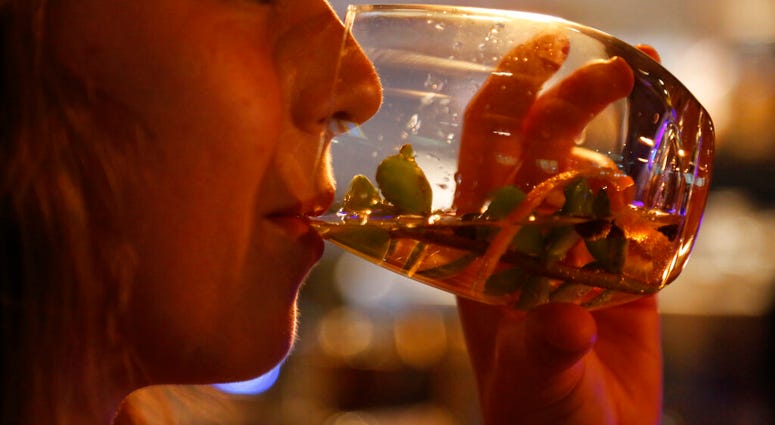 Elsabe Hanekom takes part in a gin tasting session at the Botlierskop Private Game Reserve, near Mossel Bay, South Africa, Monday, Oct. 23, 2019. (AP Photo/Denis Farrell) Elsabe Hanekom takes part in a gin tasting session at the Botlierskop Private Game Reserve, near Mossel Bay, South Africa, Monday, Oct. 23, 2019. (AP Photo/Denis Farrell)