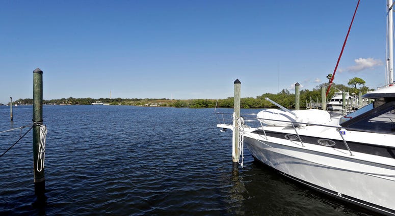 In this Nov. 30, 2017 photo, boats are shown moored in the Anclote River near the old Stauffer chemical plant site in Tarpon Springs, Fla. (AP Photo/Chris O'Meara, File)