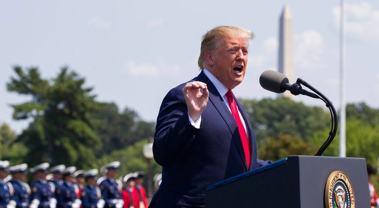 FILE - In this July 25, 2019, file phot, President Donald Trump speaks during a ceremony for new Secretary of Defense Mark Esper at the Pentagon.