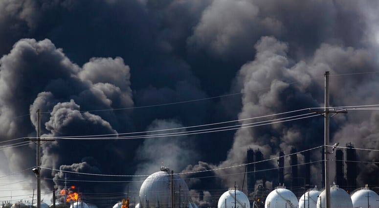 Smoke from an explosion at the TPC Group plant is seen Wednesday, Nov. 27, 2019, in Port Neches, Texas. Two massive explosions 13 hours apart tore through the chemical plant Wednesday, and one left several workers injured.