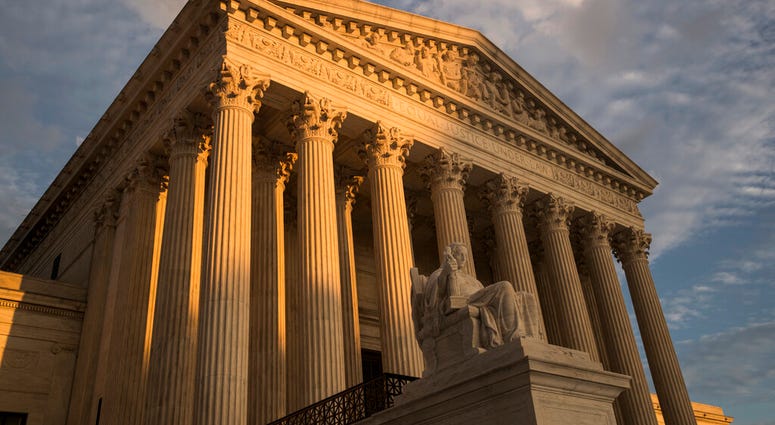 FILE - In this Oct. 10, 2017, file photo, the Supreme Court in Washington, at sunset. The Supreme Court is turning to gun rights for the first time in nearly a decade, even though New York City gun owners already have won changes to a regulation they chal