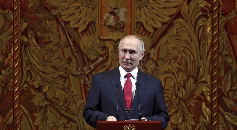 Russian President Vladimir Putin delivers his speech at a gala on the occasion of the New Year at the Bolshoi Theater in Moscow, Russia, Thursday, Dec. 26, 2019. (Mikhail Metzel, Sputnik, Kremlin Pool Photo via AP) Russian President Vladimir Putin delivers his speech at a gala on the occasion of the New Year at the Bolshoi Theater in Moscow, Russia, Thursday, Dec. 26, 2019. (Mikhail Metzel, Sputnik, Kremlin Pool Photo via AP)