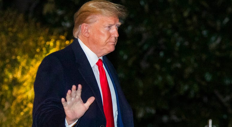 President Donald Trump waves as he leaves the White House, Monday, Jan. 20, 2020, in Washington to attend the annual economic forum in Davos, Switzerland. (AP Photo/Manuel Balce Ceneta) President Donald Trump waves as he leaves the White House, Monday, Jan. 20, 2020, in Washington to attend the annual economic forum in Davos, Switzerland. (AP Photo/Manuel Balce Ceneta)