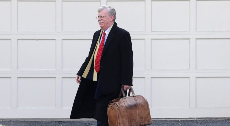 Former National security adviser John Bolton leaves his home in Bethesda, Md. Tuesday, Jan. 28, 2020. (AP Photo/Luis M. Alvarez) Former National security adviser John Bolton leaves his home in Bethesda, Md. Tuesday, Jan. 28, 2020. (AP Photo/Luis M. Alvarez)