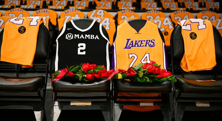 FILE - In this Jan. 31, 2020, file photo, the jerseys of late Los Angeles Laker Kobe Bryant, right, and his daughter Gianna are draped on the seats the two last sat on at Staples Center. (AP Photo/Kelvin Kuo, File) FILE - In this Jan. 31, 2020, file photo, the jerseys of late Los Angeles Laker Kobe Bryant, right, and his daughter Gianna are draped on the seats the two last sat on at Staples Center. (AP Photo/Kelvin Kuo, File)