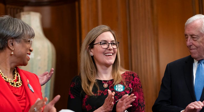 Rep. Jennifer Wexton, D-Va., center, flanked by Rep. Brenda Lawrence, D-Mich., left, and House Majority Leader Steny Hoyer, D-Md. (AP Photo/J. Scott Applewhite) Rep. Jennifer Wexton, D-Va., center, flanked by Rep. Brenda Lawrence, D-Mich., left, and House Majority Leader Steny Hoyer, D-Md. (AP Photo/J. Scott Applewhite)