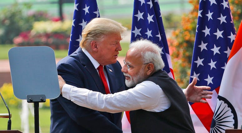 U.S. President Donald Trump and Indian Prime Minister Narendra Modi embrace after giving a joint statement in New Delhi, India, Tuesday, Feb. 25, 2020. (AP Photo/Manish Swarup) U.S. President Donald Trump and Indian Prime Minister Narendra Modi embrace after giving a joint statement in New Delhi, India, Tuesday, Feb. 25, 2020. (AP Photo/Manish Swarup)