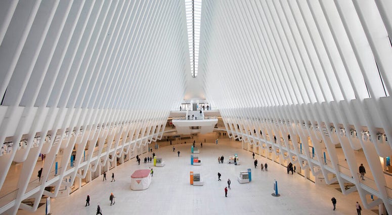The Oculus at the World Trade Center's transportation hub is sparsely occupied, Monday, March 16, 2020 in New York. (AP Photo/Mark Lennihan) The Oculus at the World Trade Center's transportation hub is sparsely occupied, Monday, March 16, 2020 in New York. (AP Photo/Mark Lennihan)