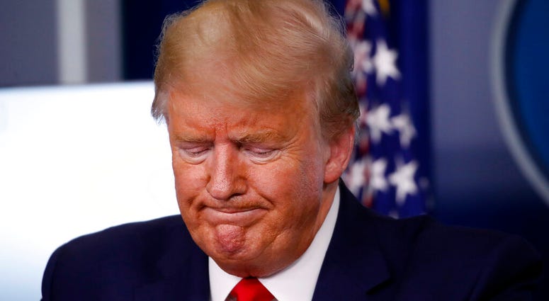 President Donald Trump pauses during a briefing about the coronavirus in the James Brady Press Briefing Room of the White House, Tuesday, March 31, 2020, in Washington. (AP Photo/Alex Brandon) President Donald Trump pauses during a briefing about the coronavirus in the James Brady Press Briefing Room of the White House, Tuesday, March 31, 2020, in Washington. (AP Photo/Alex Brandon)