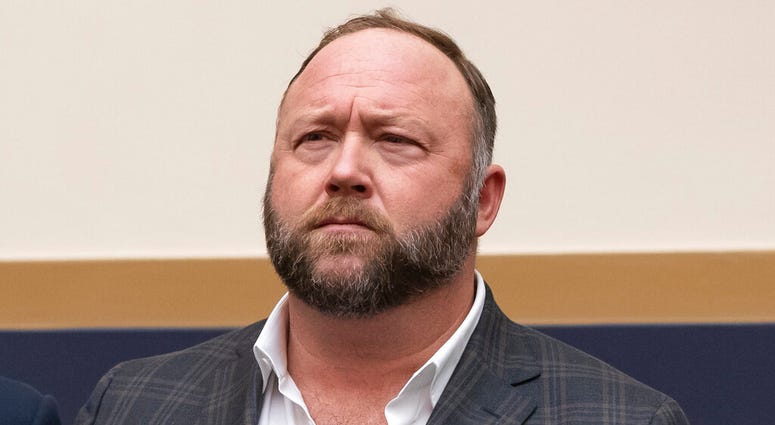 FILE - This Tuesday, Dec. 11, 2018 file photo shows radio show host and conspiracy theorist Alex Jones at Capitol Hill in Washington.