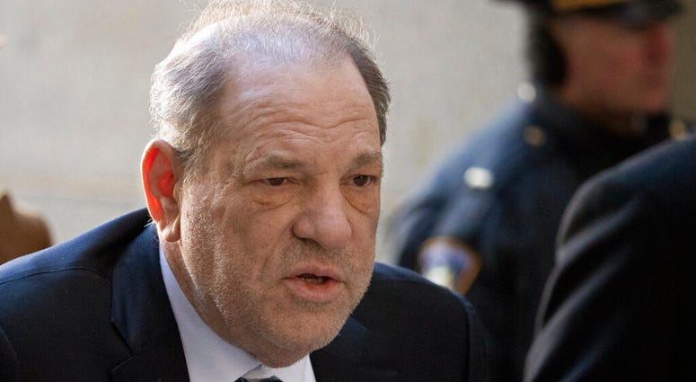 FILE - In this Feb. 21, 2020, file photo, Harvey Weinstein arrives at a Manhattan court as jury deliberations continue in his rape trial in New York.